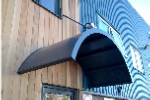 Curved entrance door canopy
