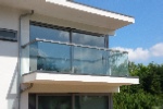 Modern balcony rail with square glass supports